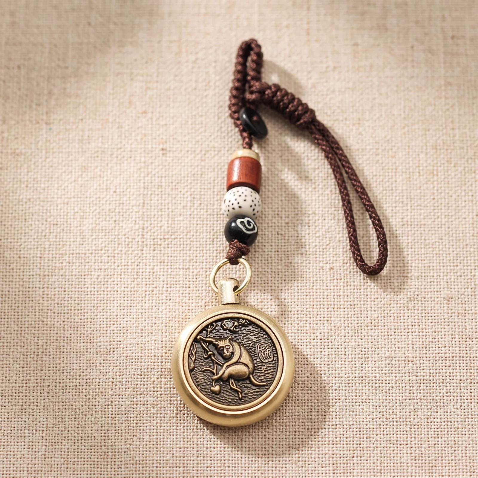 Spinning Zodiac Coin Brass Keychain