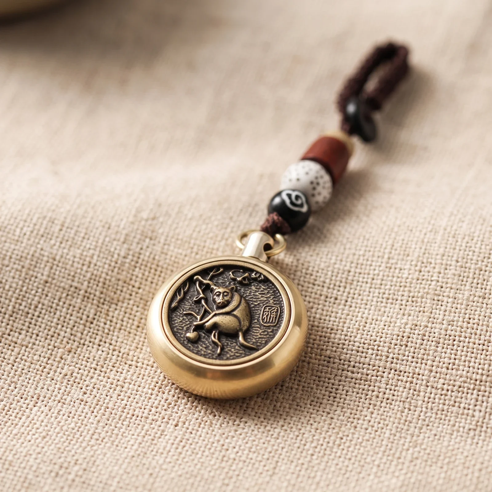 Spinning Zodiac Coin Brass Keychain — photo 2