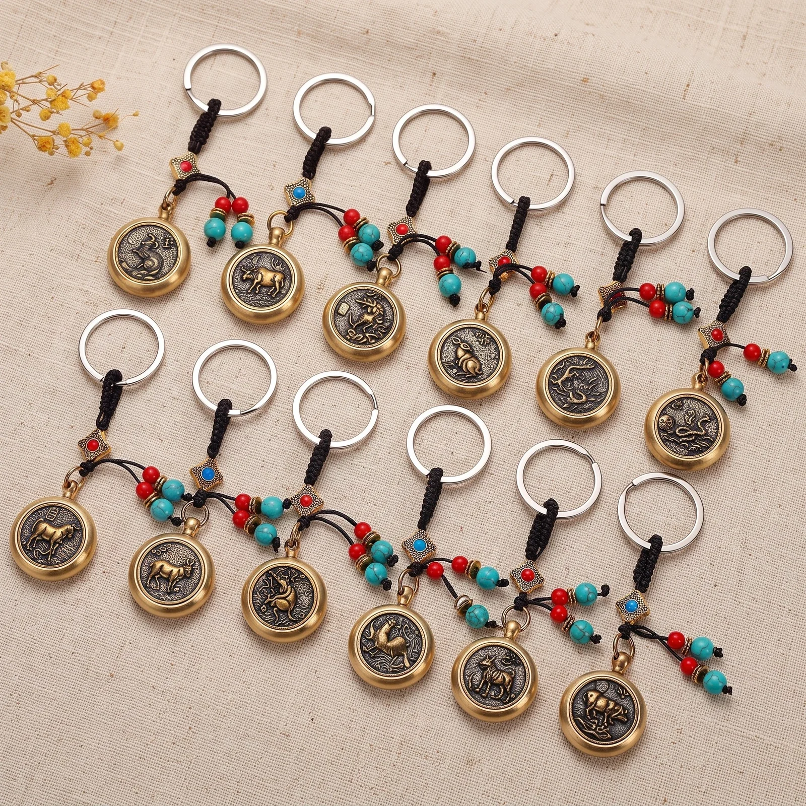 Spinning Zodiac Coin with Green Bead Keychain — photo 2